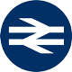 White rail icon on green roundel