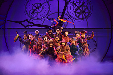 Production shot of Wicked cast on stage